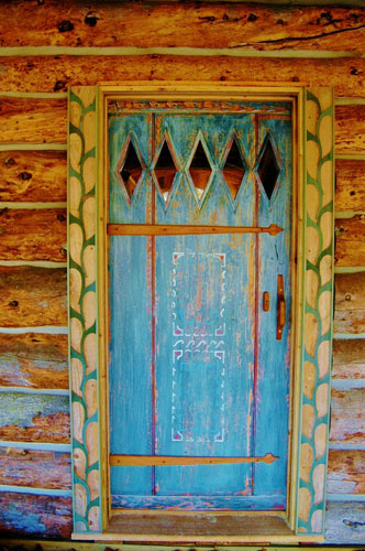 photo of restored naskeag cabin door from outside 