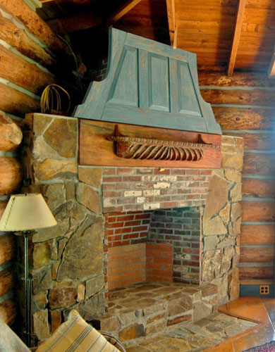photo of restored naskeag cabin closeup of fireplace